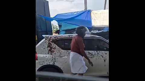 Scooter rider's 'revenge' on car that splashed muddy water