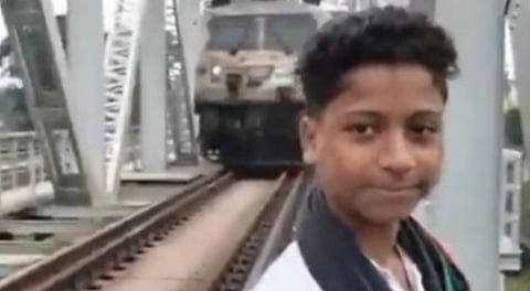 A 15-year-old boy who was standing near the track to take a reel