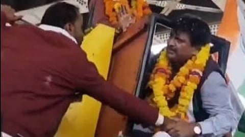 BJP MP Rides Crane To Garland Statue, Slaps Operator After It Jolts
