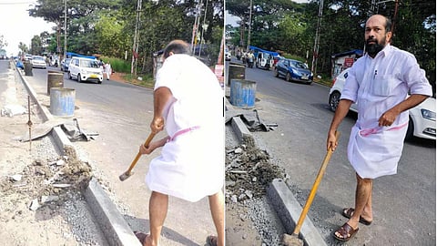 Former MLA Anil Akkara smashed the divider in Thrissur