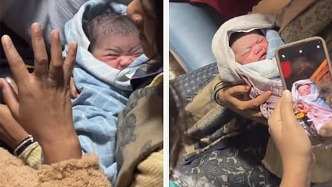 Woman in labor pains while traveling on a busy train