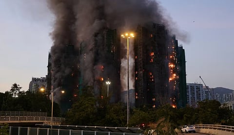 major fire engulfing apartment blocks in Hong Kong