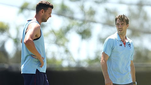 Cummins and Hazlewood during training