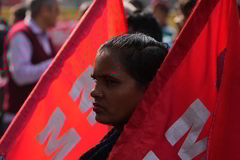 Members of various Indian trade unions participate in a protest against the government's rollout of new labor codes in New Delhi