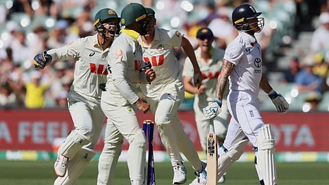 Australian players celebrate after England's Ben Stokes