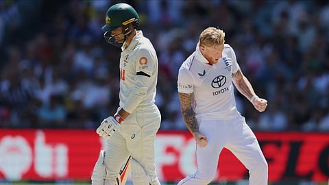 England's Ben Stokes, right, celebrates after dismissing Australia's Alex Carey