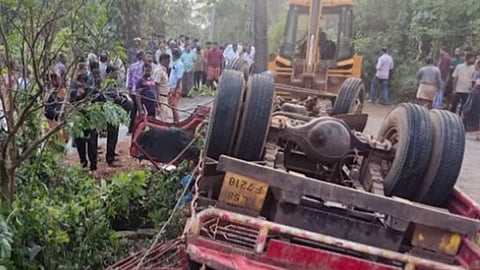 Two people died after a lorry carrying a concrete mixer overturned in Payyavoor