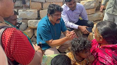 CPM Rajya Sabha MP AA Rahim talking with the residents of Fakir colony