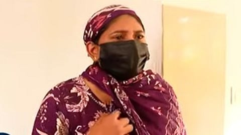 Woman and her child are stranded on their porch in Feroke