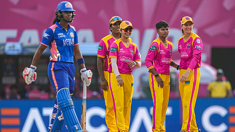 UP Warriorz players celebrate their wicket