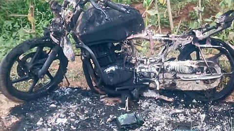 Demonstration in support of V V Kunjikrishnan in Payyannur; Supporter's bike burned