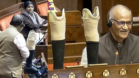 C Sadanandan places his feet on the table in Rajya Sabha