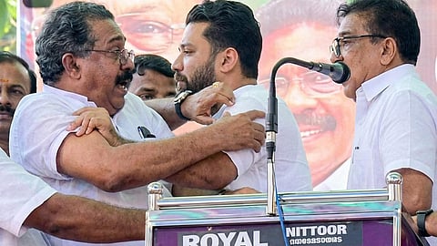 DCC President Praveen Kumar reacts to the scuffle during VD Satheesan’s puthuyuga yatra