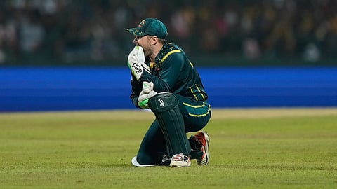 Australia's Josh Inglis reacts after missing a catch opportunity during the T20 World Cup cricket match between Sri Lanka and Australia