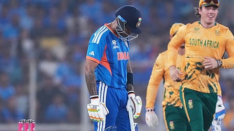 India's captain Suryakumar Yadav, left, reacts after losing his wicket during the T20 World Cup cricket match between India and South Africa in Ahmedabad