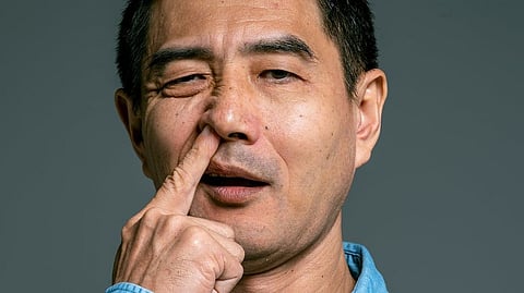 picking one's nose