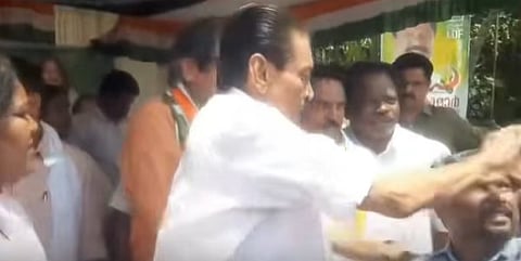 Idukki DCC President pushes away disabled activist trying to take photo with Tharoor