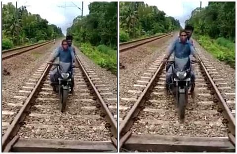 കണ്ടെയ്ന്മെന്റ് സോണില് നിന്ന് പുറത്തുകടക്കാന് റെയില്വെ ട്രാക്കിലൂടെ ബൈക്ക് യാത്ര; ഒടുവില് സംഭവിച്ചത് (വീഡിയോ)