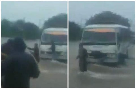 കുത്തിയൊലിച്ച് വെള്ളം; കുടുങ്ങിയ ബസ്സിനെ കെട്ടിവലിച്ച് രക്ഷാപ്രവര്ത്തനം (വീഡിയോ)