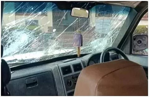 അക്രമികള് അടിച്ചുതകര്ത്ത പിജുഷ് ബിശ്വാസിന്റെ കാര്