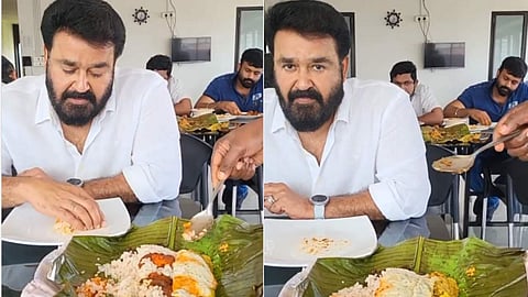 മോഹന്ലാല് പൊതിച്ചോറ് കഴിക്കുന്ന ദൃശ്യം