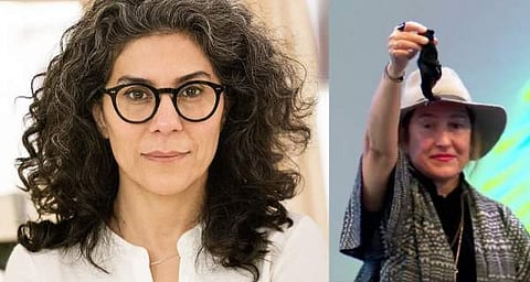 മഹ്നാസ് മുഹമ്മദി/ ഫെയ്സ്ബുക്ക്, ചലച്ചിത്ര മേളയില് മെഹ്നാസിന്റെ മുടി ഉയര്ത്തിക്കാട്ടുന്ന അതീന റേച്ചല്/ വിഡിയോ സ്ക്രീന്ഷോട്ട്