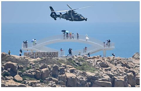 തായ്വാന് തൊട്ടടുത്തുള്ള പിങ്ടാണ് ദ്വീപിന് സമീപത്തുകൂടി പറക്കുന്ന ചൈനീസ് സൈനിക ഹെലികോപ്റ്റര്/എഎഫ്പി