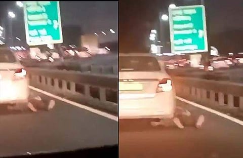 ടാക്സി ഡ്രൈവറെ റോഡിലൂടെ വലിച്ചിഴയ്ക്കുന്നതിന്റെ വിഡിയോ ദൃശ്യം