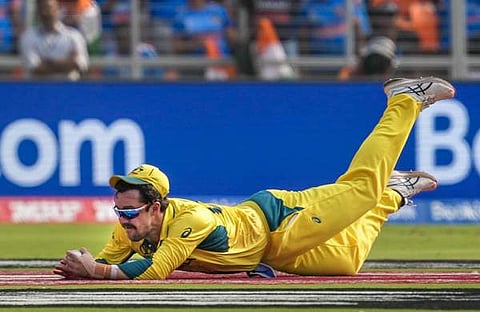 ഉജ്ജ്വല ക്യാച്ചിൽ രോഹിതിനെ പുറത്താക്കുന്ന ട്രാവിസ് ഹെഡ്ഡ്/ പിടിഐ