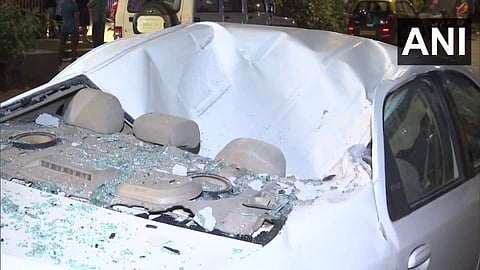 സിമന്റ് കട്ടകള് വീണ് കാര് തകര്ന്ന നിലയില്, എഎന്ഐ