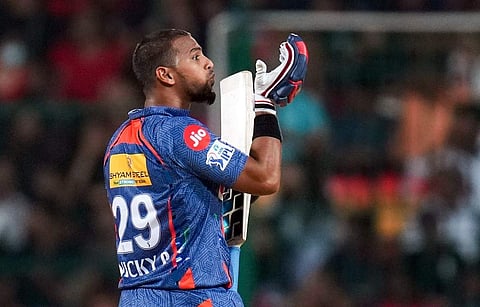 അർധ സെഞ്ച്വറി നേട്ടം ആഘോഷിക്കുന്ന പുരൻ/ പിടിഐ