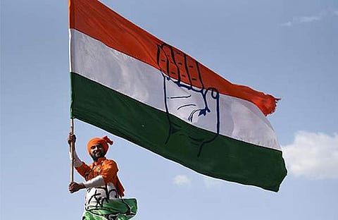 കോണ്ഗ്രസ് പ്രവര്ത്തകന്റെ ആഹ്ലാദം/ എഎന്ഐ