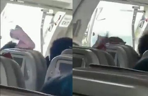 പറക്കുന്നതിനിടെ വിമാനത്തിന്റെ വാതിൽ തുറന്നു/ വിഡിയോ സ്ക്രീൻഷോട്ട്