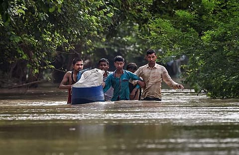 ഡല്ഹിയില് താഴ്ന്ന പ്രദേശങ്ങളില് വെള്ളം കയറിയപ്പോള്, പിടിഐ