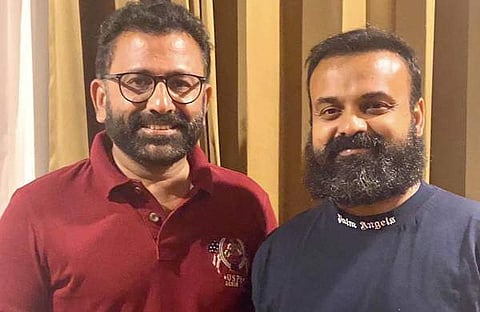 കുഞ്ചാക്കോ ബോബനും ആസാദ് കണ്ണാടിക്കലും/ ഫെയ്സ്ബുക്ക്