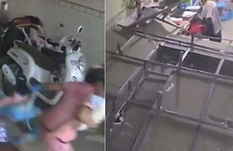 കുഞ്ഞിനെ രക്ഷപ്പെടുത്തി അമ്മ/ വിഡിയോ സ്ക്രീൻഷോട്ട്