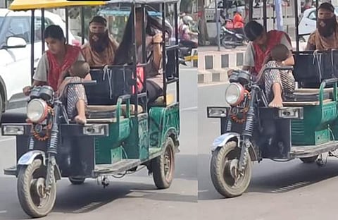 കുഞ്ഞിനെയും കൊണ്ട് ഓട്ടോ ഓടിക്കുന്ന യുവതി/ ഇൻസ്റ്റഗ്രാം വിഡിയോ