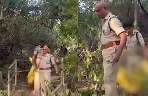 കുട്ടിയുടെ മൃതദേഹം ആശുപത്രിയിലേക്ക് മാറ്റുന്നു/ എക്സ്പ്രസ് ഫോട്ടോ