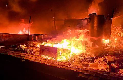 ഗുരുഗ്രാമിൽ അക്രമികൾ കടകൾ തീവെച്ചു നശിപ്പിച്ചപ്പോൾ/ പിടിഐ