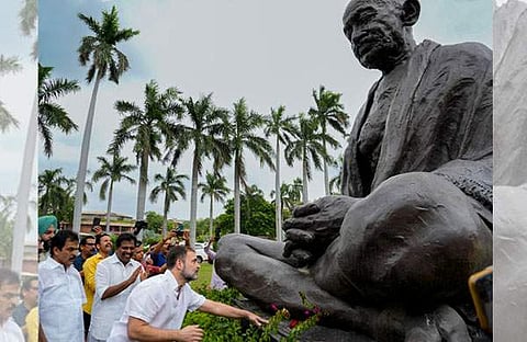 രാഹുല് ഗാന്ധി പാര്ലമെന്റ് വളപ്പിലെ ഗാന്ധി പ്രതിമയെ വണങ്ങുന്നു/പിടിഐ