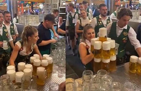 13 ബിയര് മഗ്ഗുകളുമായി യുവതി/ എക്സ് വിഡിയോ സ്ക്രീൻഷോട്ട്
