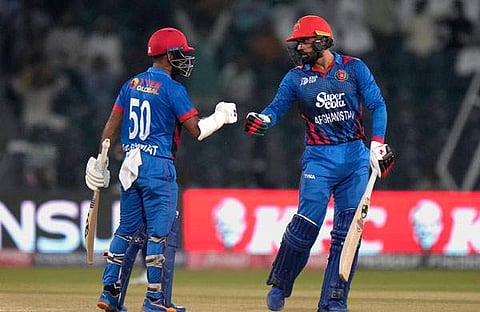 അഫ്ഗാന് താരങ്ങളായ മുഹമ്മദ് നബിയും ഹഷ്മത്തുള്ളയും/ പിടിഐ