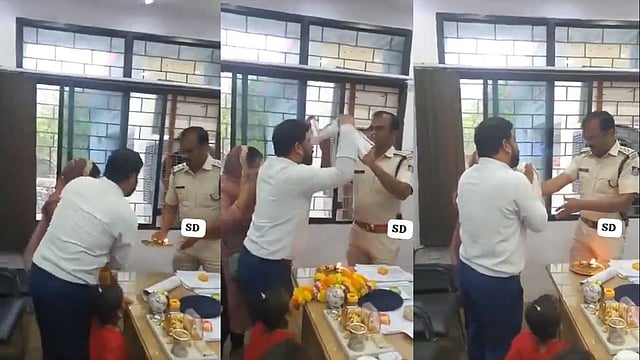 'നിങ്ങൾ നന്നായി വരട്ടെ'; മോഷണ പരാതിയിൽ അന്വേഷണം വൈകിപ്പിച്ചു, പൊലീസുകാരെ ആരതിയുഴിഞ്ഞ് കുടുംബം, വേറിട്ട പ്രതിഷേധം, വൈറൽ
