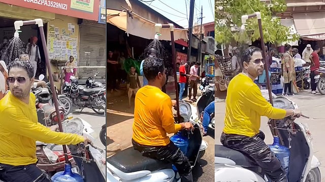 'ഇതല്ല, ഇതിന്റപ്പുറം ചാടിക്കടന്നവനാണീ..!  സ്‌കൂട്ടറില്‍ ഷവര്‍ ഘടിപ്പിച്ച് യുവാവിന്റെ യാത്ര; വൈറല്‍ വിഡിയോ