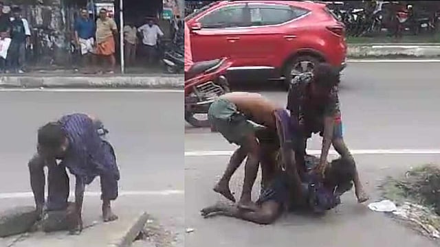 മദ്യലഹരിയിൽ നടുറോഡിൽ തമ്മിലടിച്ച് യുവാക്കൾ; കല്ലുകൊണ്ട് തലയ്ക്കടിക്കാൻ ശ്രമം; വിഡിയോ
