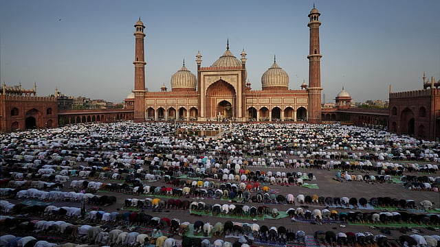 Devotees offer prayers (namaz) on the occasion of the Eid-ul-Adha festival, at Jama Masjid in New Delhi