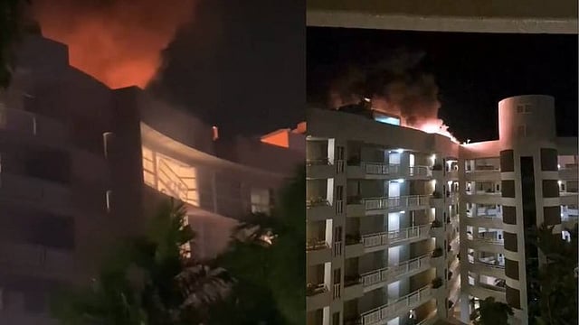 Helicopter crashes into roof of hotel