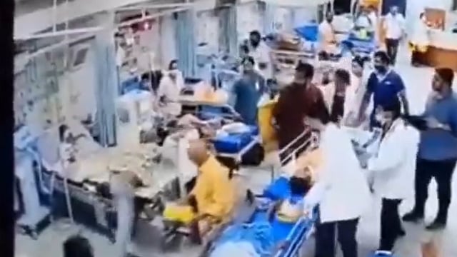 Patient Grabs Woman Doctor By Hair, Bangs Head