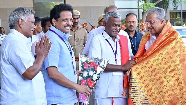 Delegates welcome Chief Minister Pinarayi Vijayan, who arrived in Madurai for the party congress