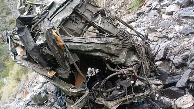 Army vehicle overturns into gorge